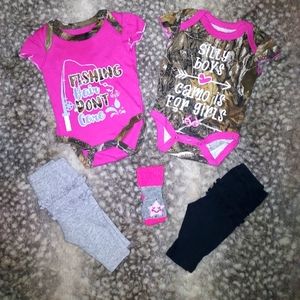 2 NWOT RealTree onesies. 2 pack Carters pants. 1 pair of socks.